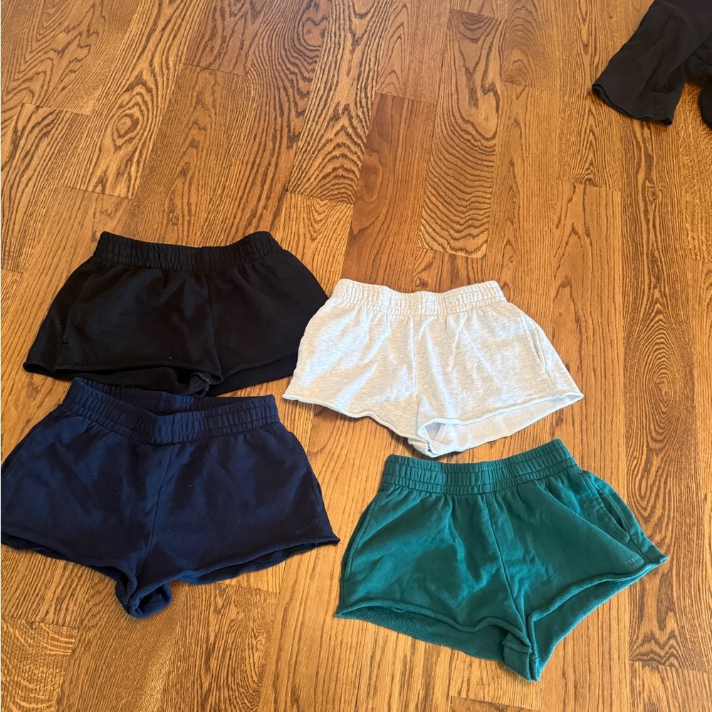 4 pairs of garage shorts- barely worn! my daughter wants the next size.